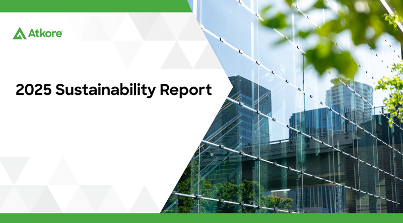 Atkore Sustainability Report 2025 - Glass windows with a tree with green leaves